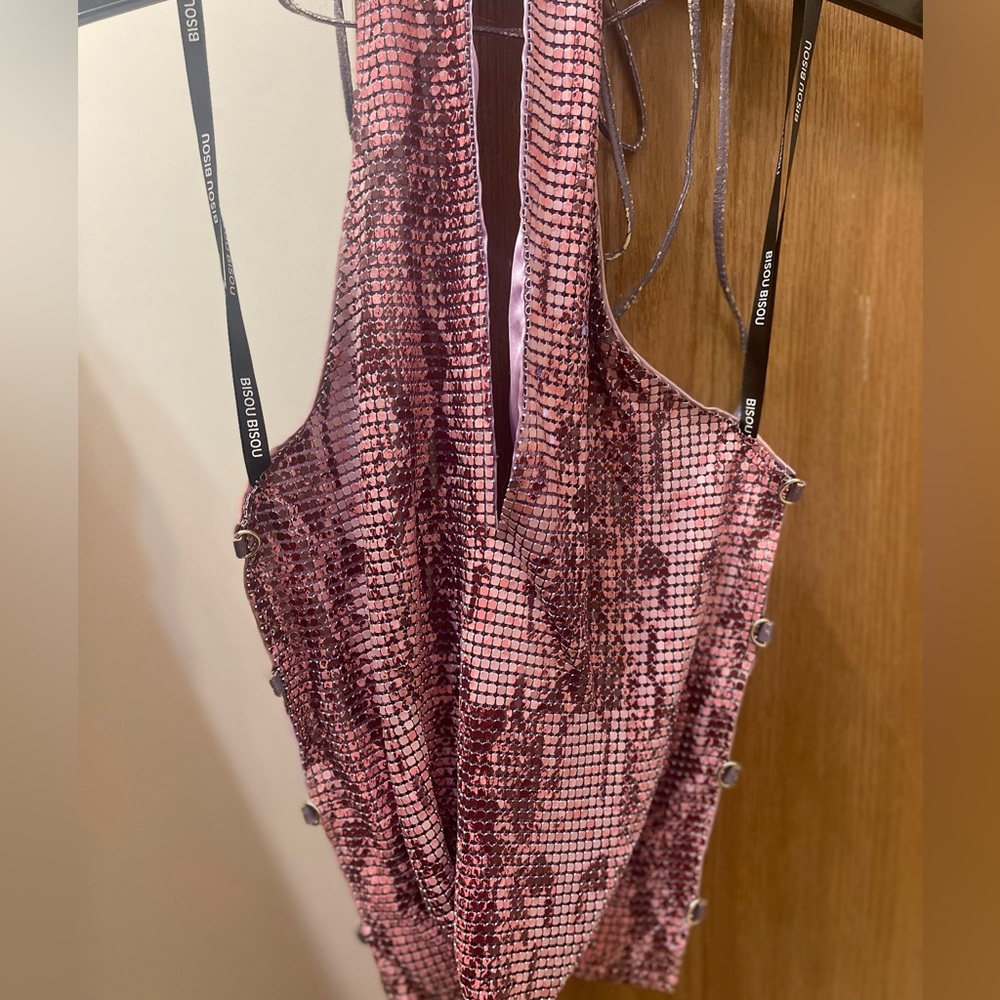 Sequin open back with leather straps for closer